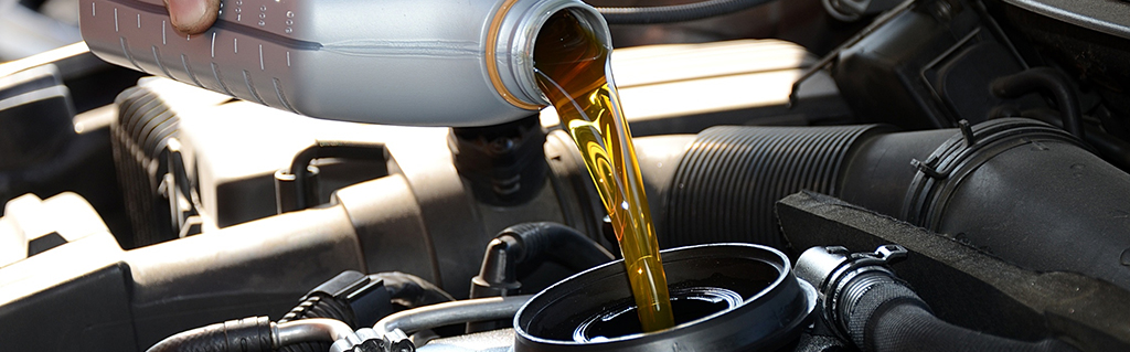 Oil being poured into an engine
